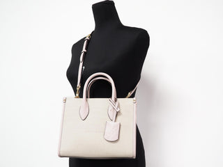 Bolso bandolera shopper pequeño Mirella de lona color Powder Blush de Michael Kors