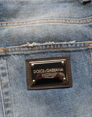 Jeans de mezclilla azul de algodón desgastados y rectos  