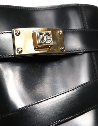 Botas de media caña con placa DG de cuero negro