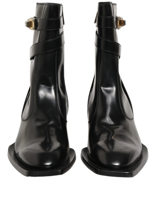 Botas de media caña con placa DG de cuero negro