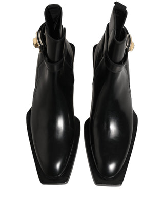 Botines con placa DG de cuero negro