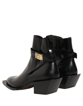 Botines con placa DG de cuero negro