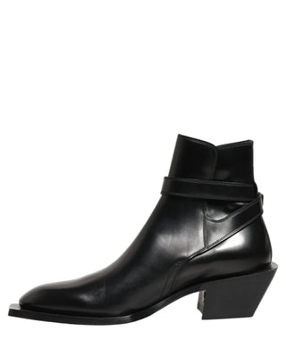 Botines con placa DG de cuero negro