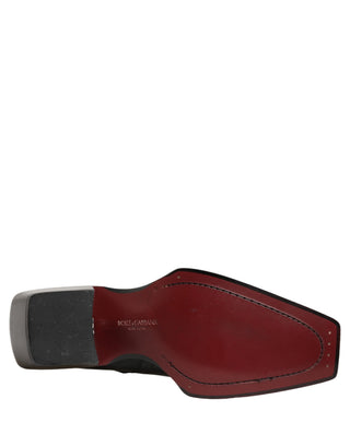 Botines con placa DG de cuero negro