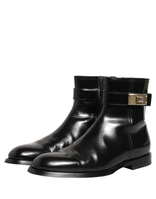 Botas de media caña con hebilla y logo de cuero negro