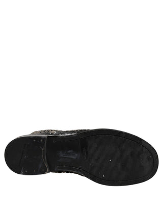 Botines de cuero negro con tachuelas estilo pasarela