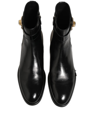 Botas de media caña con hebilla y logo de cuero negro