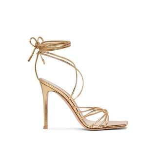 Sandalias doradas de tacón stiletto de piel de becerro