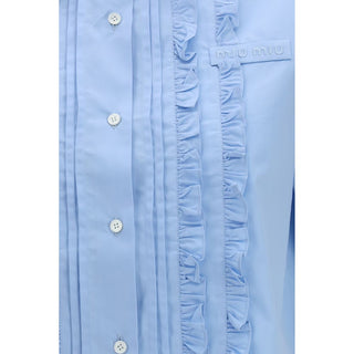 Camisa azul de algodón de manga corta