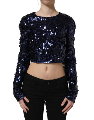 Blusa corta azul con mangas largas y lentejuelas