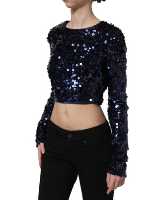 Blusa corta azul con mangas largas y lentejuelas