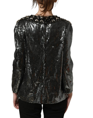 Blusa adornada con lentejuelas metálicas grises
