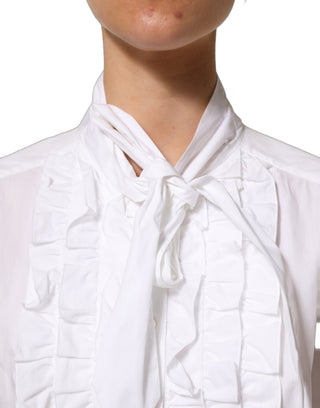 Blusa blanca con volantes y manga larga