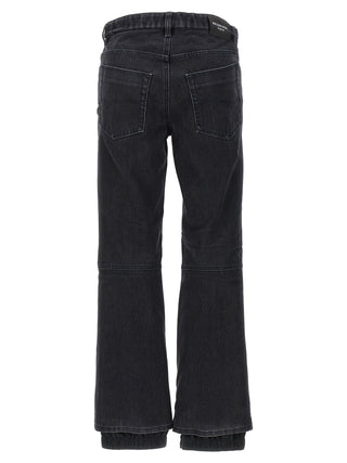Jeans acampanados de algodón negro