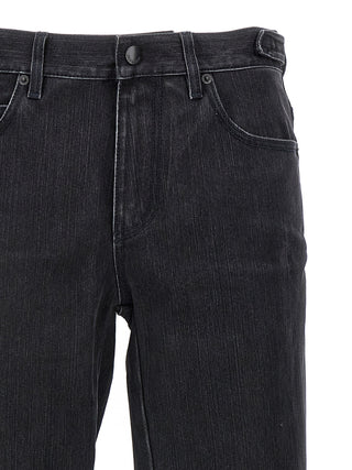 Jeans acampanados de algodón negro