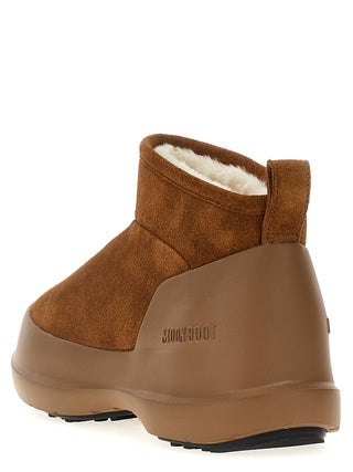 Botas planas de cuero marrón