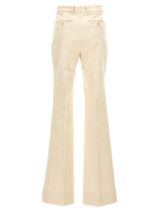 Pantalones acampanados blancos de algodón