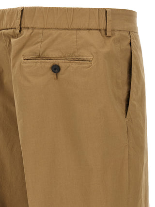 Pantalones casuales de algodón beige  