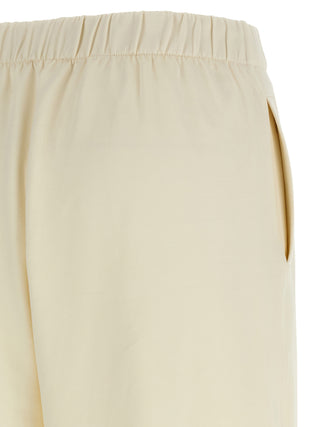 Pantalones casuales blancos de seda