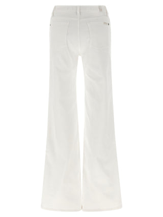 Jeans acampanados de algodón blanco