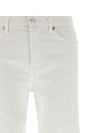 Jeans acampanados de algodón blanco