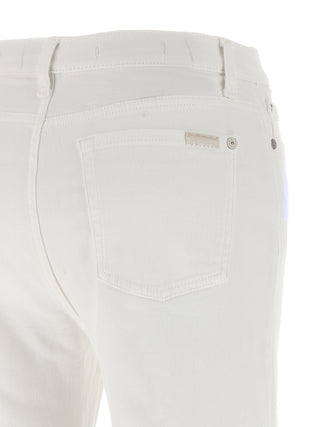 Jeans acampanados de algodón blanco