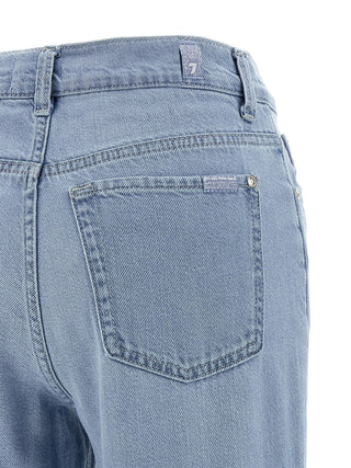 Jeans acampanados azules de algodón