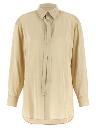 Blusa de seda beige