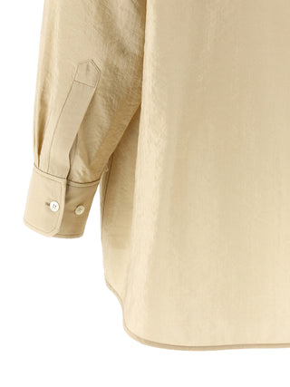 Blusa de seda beige