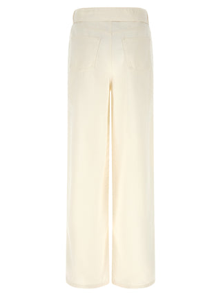 Jeans acampanados de algodón blanco