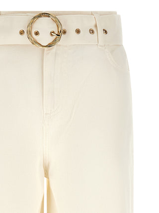 Jeans acampanados de algodón blanco