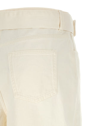 Jeans acampanados de algodón blanco
