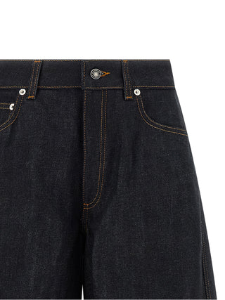 Jeans acampanados azules de algodón