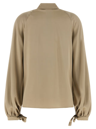 Blusa de seda beige