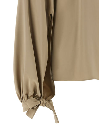 Blusa de seda beige
