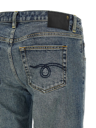 Jeans acampanados azules de algodón