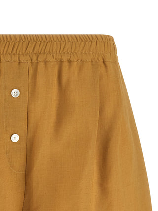 Bermudas bicolor de piel de becerro  