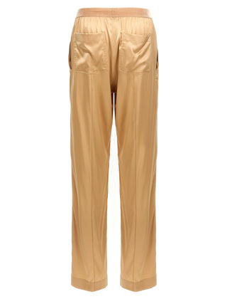 Pantalones casuales beige de seda