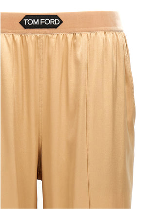 Pantalones casuales beige de seda