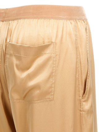 Pantalones casuales beige de seda