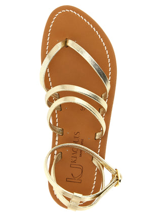 Sandalias planas doradas de piel de vaca