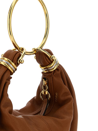 Bolso de mano marrón de becerro