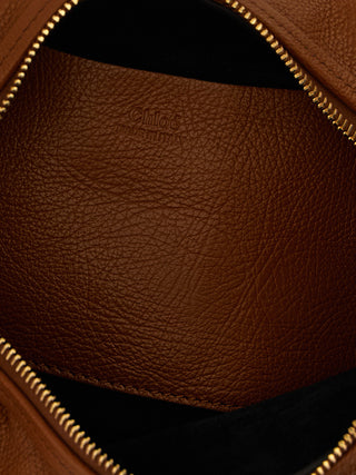 Bolso de mano marrón de becerro