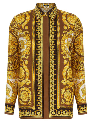 Blusa de seda dorada