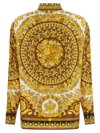 Blusa de seda dorada