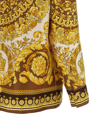 Blusa de seda dorada