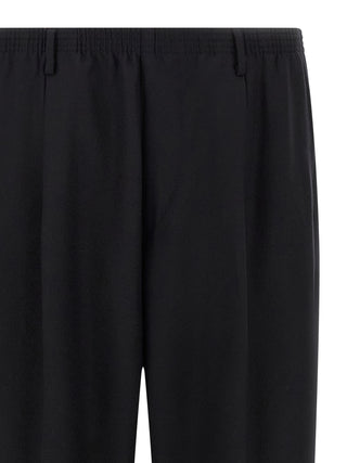Pantalones casuales de lana negra