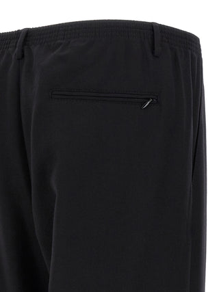 Pantalones casuales de lana negra