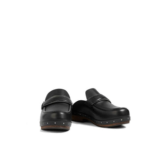 Mules de cuero negro