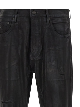 Jeans acampanados de algodón negro